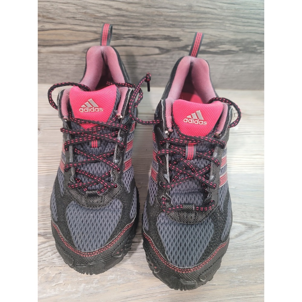 Adidas womans shoe size 7 black and pink. good condition